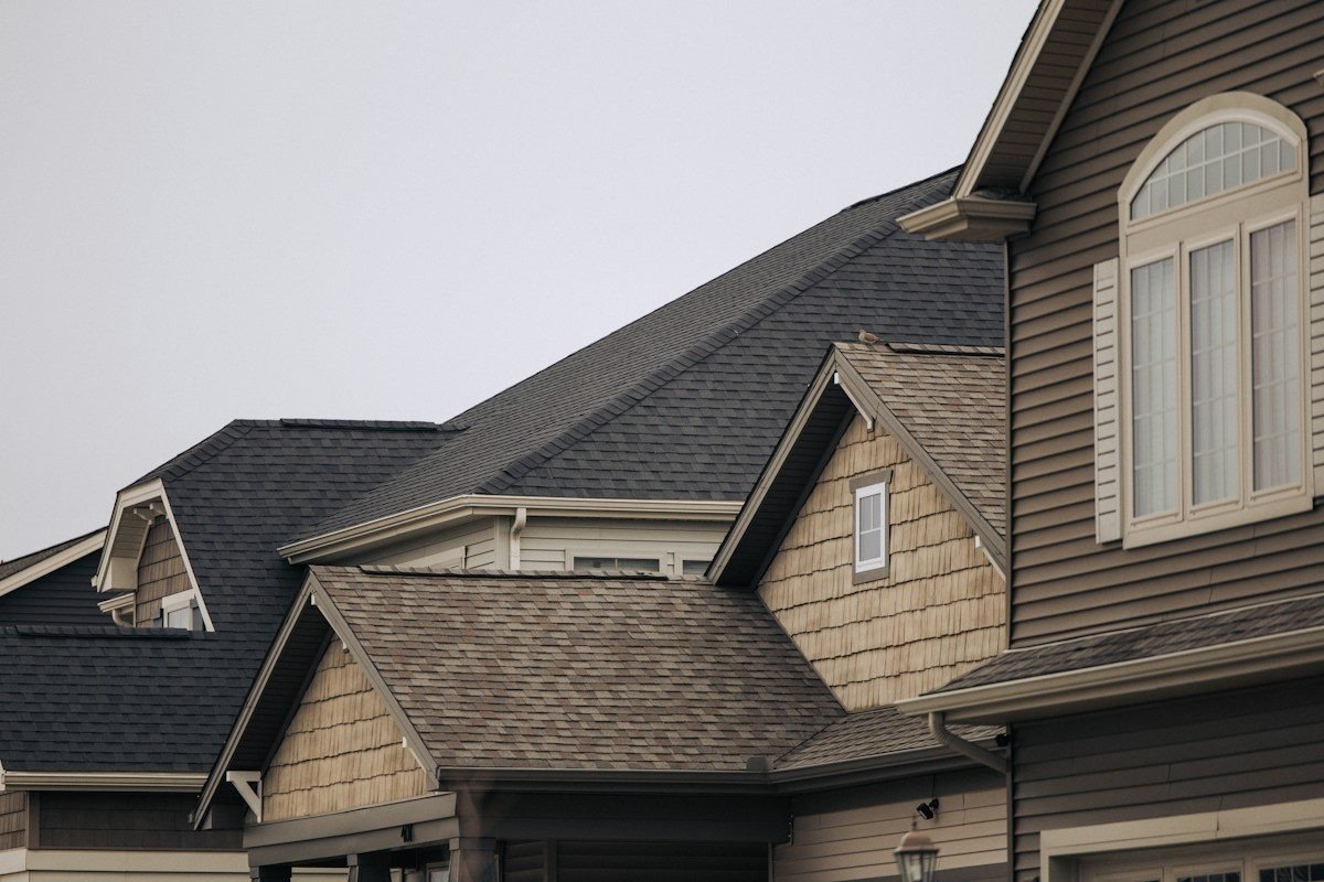 Several rooflines covered in architectural asphalt shingles